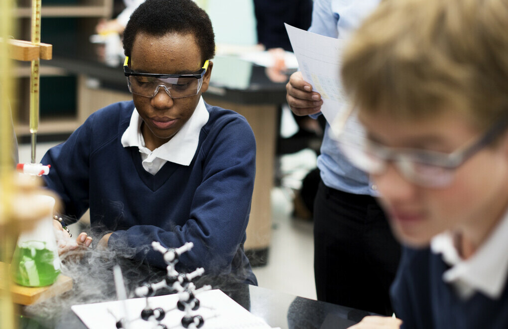Students in a lab working with molecules