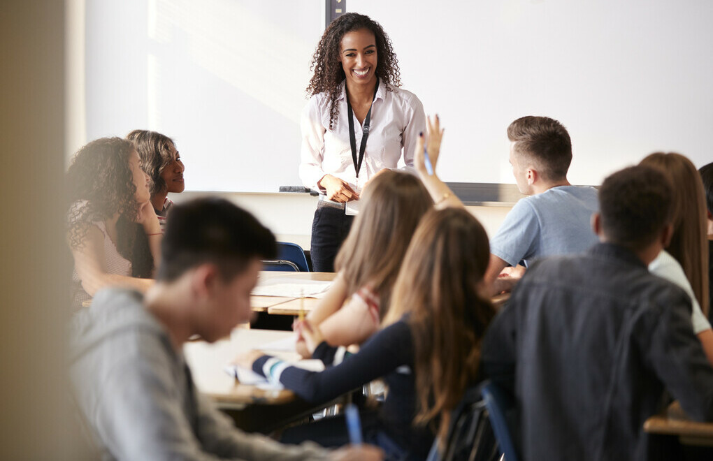 Picture of students and a teacher in classroom